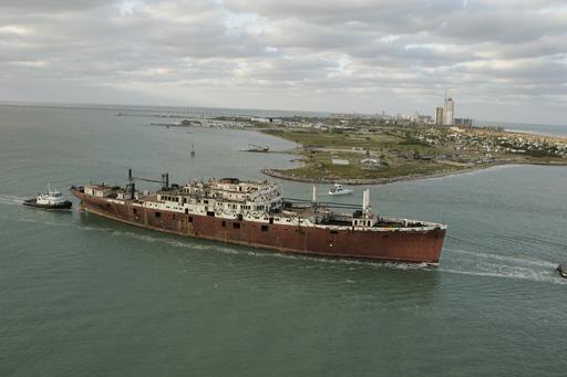 The Texas Clipper makes its final journey Friday, November 16, 2007 to its underwater resting place in the Gulf of Mexico, 17 miles off South Padre Island,
					where it will begin its new life as an artificial reef for marine wildlife.